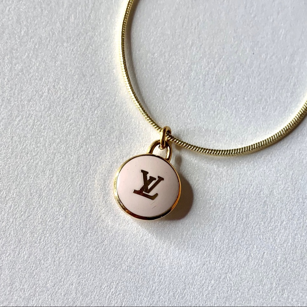 Louis Vuitton charm with necklace (authentic)
